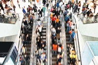 Shoppers escalators1 photo via Shutterstock