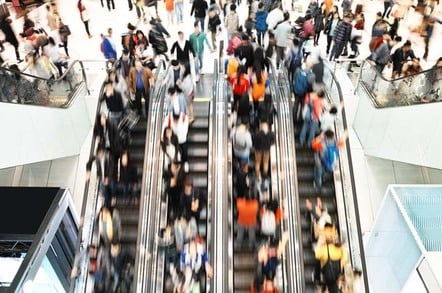Shoppers escalators1 photo via Shutterstock
