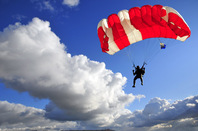 Parachutist image via Shutterstock