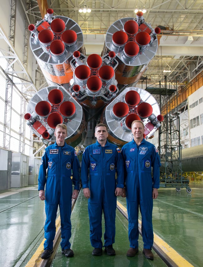 Tim Peake, Yuri Malenchenko and Tim Kopra pose with the Soyuz TMA-19. Pic: Esa