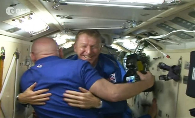 Scott Kelly welcomes Tim Peake aboard the ISS