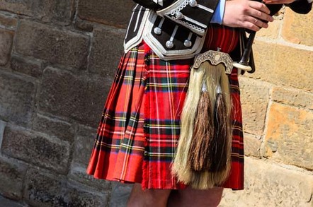 Bagpiper in a kilt. Photo via Shutterstock