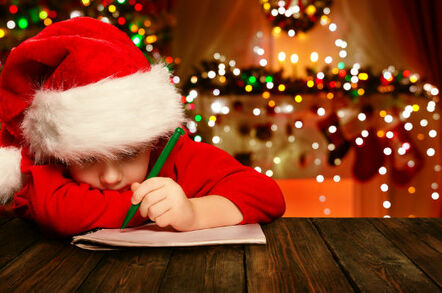 Boy writes a letter to Santa. Pic via Shutterstock