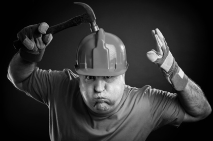 Hammer and hardhat, image via Shutterstock