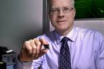 NASA's Mike Krainak with the silicon-photonic chip