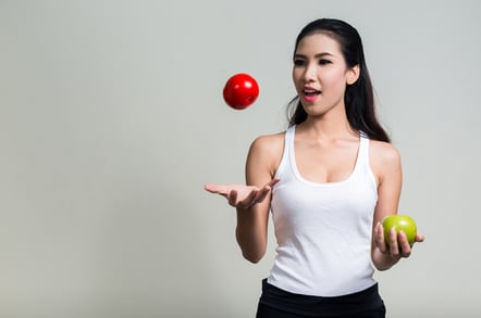 Juggling apple image via Shutterstock