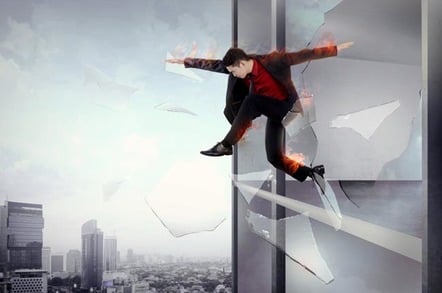 Man jumps out of window of burning building. Pic by Shutterstock