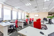 Empty office space, image vIa Shutterstock