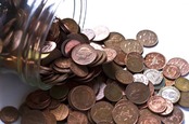 Pennies in a jar. Photo via Shutterstock