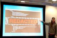 Stevie Graham shows off his successfully reverse engineered mobile banking app at QCon