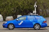 Blue Google HERE car with camera attached