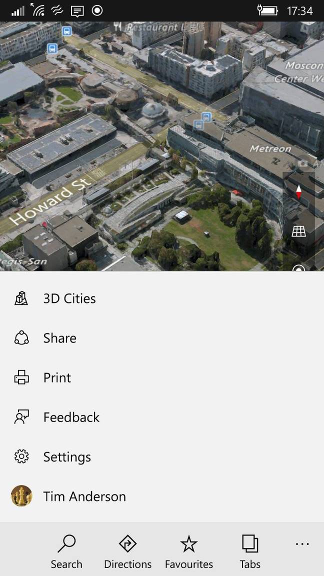 The new Maps app on Windows 10 Mobile showing the bottom menu and a 3D city view