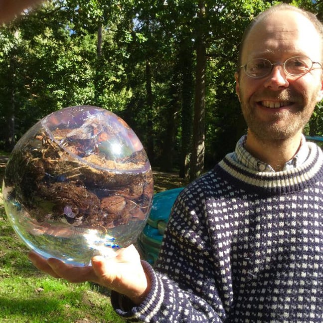 Dan Roberts with an encapsulated lion poo. Pic: The National Poo Museum