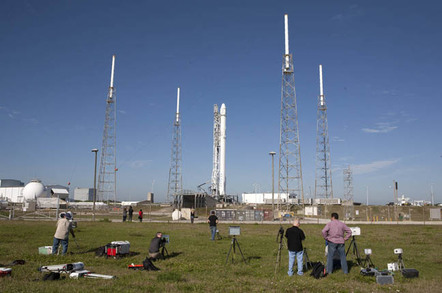 As a Falcon 9 rocket stands ready for lifts off at Cape Canaveral Air Force Station's Space Launch Complex 40, photojournalists set up cameras to record the event. The rocket will launch a Dragon resupply spacecraft to the International Space Station, or ISS. Liftoff is scheduled for April 8, 2016 at 4:43 p.m. EDT. On its eighth commercial resupply services mission to the ISS, Dragon will bring up almost 7,000 pounds of supplies, such as new science experiments and equipment for technology research. Photo credit: NASA/Kim Shiflett