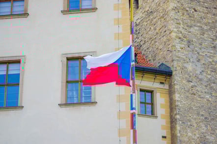 Flag of czech republic on cobbled stret in prague. Photo by Shutterstock - editorial use only
