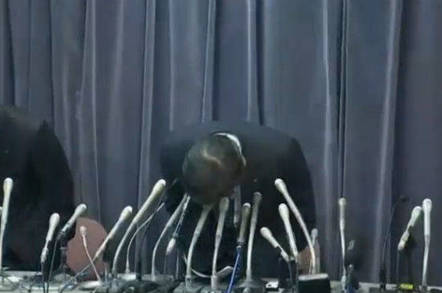 Mitsubishi president bowing in apology