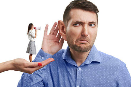 Lady standing on a hand with a megaphone shouting into mans ear