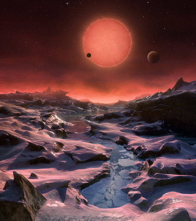 Artist's impression of the TRAPPIST-1 system seen from one of the planets. Pic: ESO / M. Kornmesser