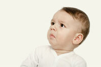 Baby looks taken aback/shocked/affronted. Photo by Shutterstock