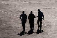 Arrested, image via Shutterstock