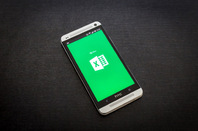 Excel on smart phone, photo via RoSonic on Shutterstock