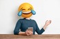 Woman with "crying with laughter" emoji for a head... photo by Shutterstock