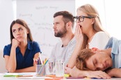 Group of young people yawning/looking bored. Photo by shutterstock