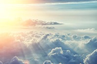 Sun shines on the clouds. Photo by Shutterstock