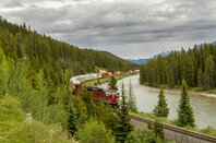 A freight train travels through the Bow Valley - Banff National Park, Alberta, Canada.  Photo by Brian Lasenby via Shutterstock