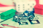 Car on Monopoly board. PHOTO BY Kamira, editorial use ONLY VIA SHUTTERSTOCK