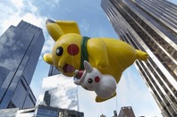 Giant Pikachu Pokemon balloon flown at the 89th Annual Macy's Thanksgiving Day Parade on Columbus Circle. EDITORIAL USE ONLY. Photo credit: Lev Radin / Shutterstock.com 