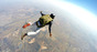 Parachutist image via Shutterstock