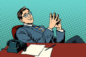 Boss leans back comfortably in desk. Pic via Shutterstock