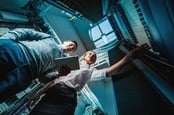 Two execs in a server room. Has to have happened some time heh. Photo by Shutterstock