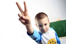 Boy two fingers, photo via Shutterstock