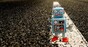 Robot on road photo via Shutterstock