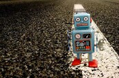 Robot on road photo via Shutterstock