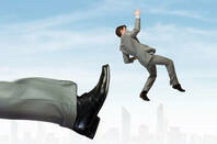 Man being kicked by oversized leg with city in background