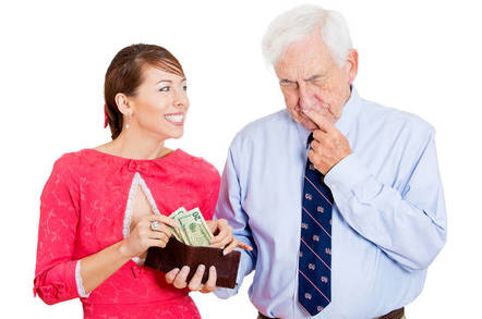A man handing out cash