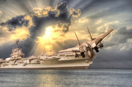 aircraft takes off from carrier, enters clouds. Photo by shutterstock