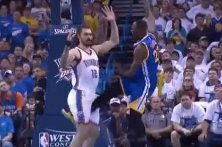 Golden State Warriors player kicking a rival