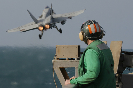 Aircraft carrier take off photo via Shutterstock