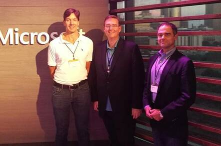 Microsoft's Mark Russinovich with customer Daryll Fogal and Docker COO Scott Johnston
