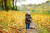 Crying baby in autumn. Photo by shutterstock