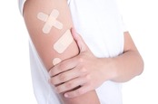 plasters cover arm. photo by shutterstock