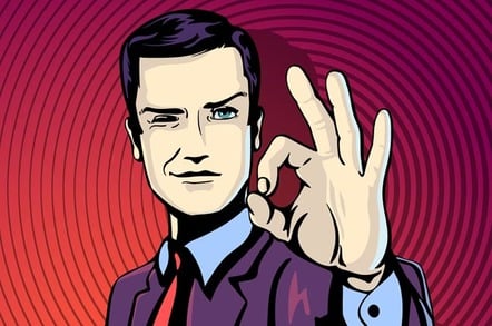 Businessman makes A-OK sign. Photo by Shutterstock