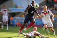 RIO DE JANEIRO, BRAZIL - JULY 04, 2014: Pogba of France and Hoewedes of Germany during the World Cup Quarter-finals game between France and Germany in the Estadio Maracana. NO USE IN BRAZIL.