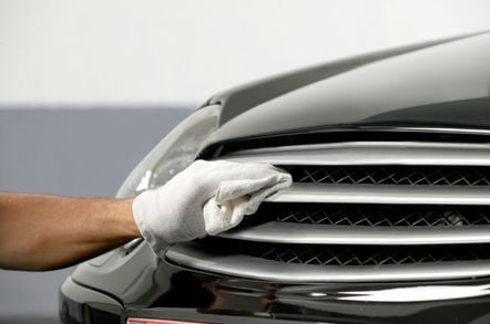Car polishing photo via Shutterstock
