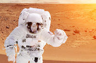 Astronaut on mars . Photo by shutterstock