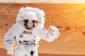 Astronaut on mars . Photo by shutterstock